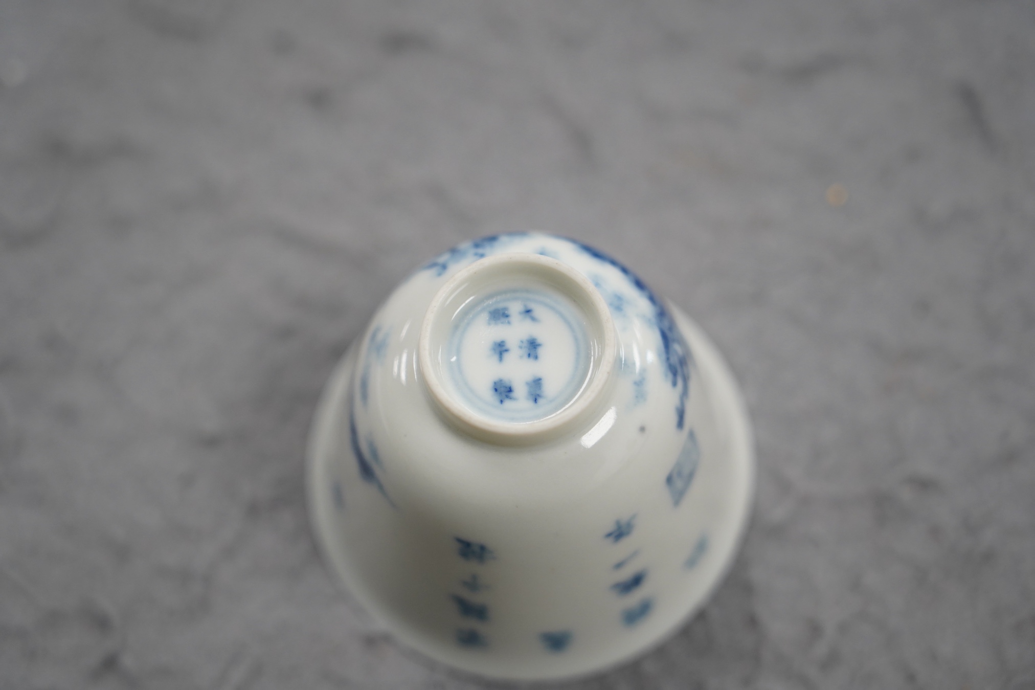 A Chinese blue and white 'month' cup, Kangxi mark, probably late 19th century